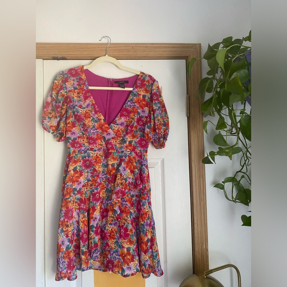 Beautiful flower dress/thrifted from forever 21. size M! It fits like a small